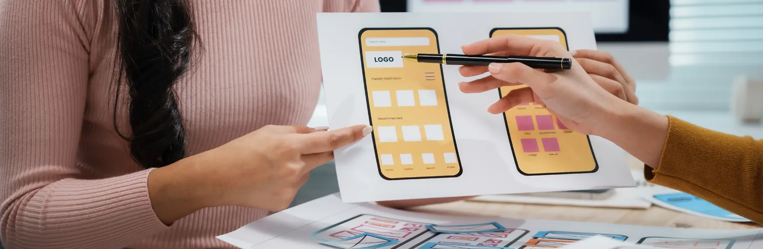 Creatives planning out a mobile-first website project